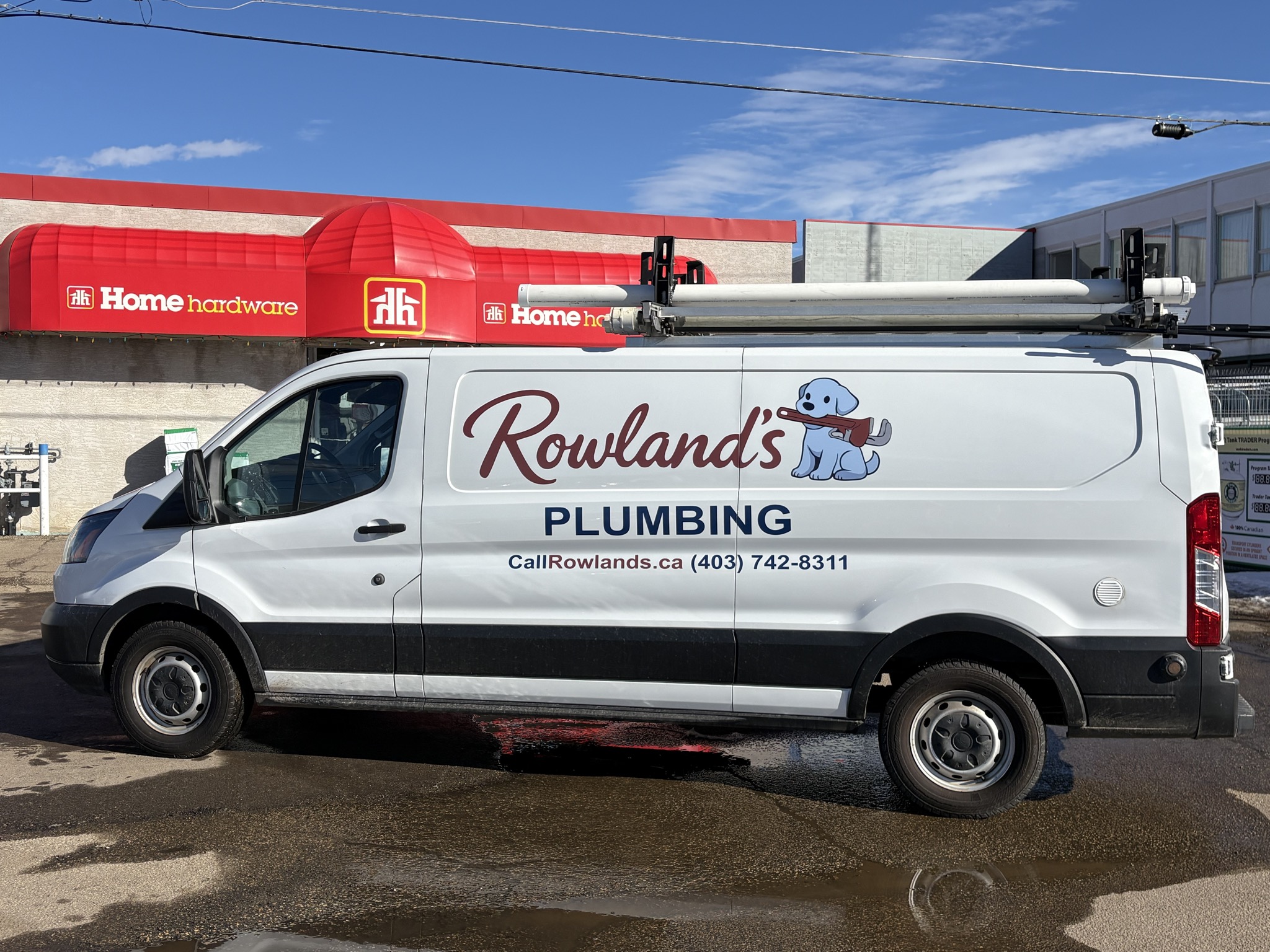 Rowland's Plumbing service van in Stettler, Alberta