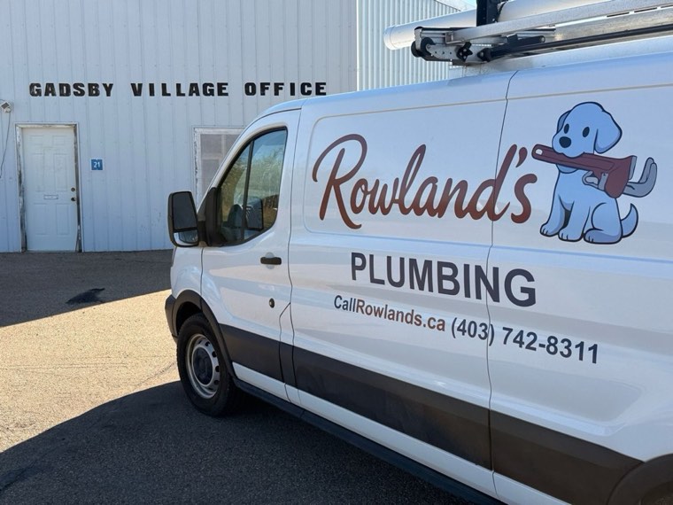 Rowland's Plumbing van at the Gadsby Village Office